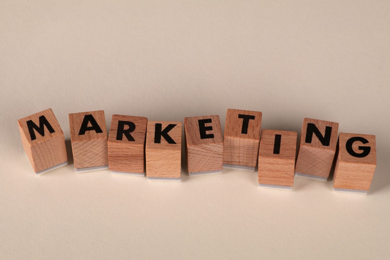 services-01 Wooden blocks with letters spelling 'marketing', ideal for business and advertising visuals.